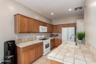 Move-in ready home in the Augusta Ranch golf course community! on Augusta Ranch Golf Club in Arizona - for sale on GolfHomes.com, golf home, golf lot