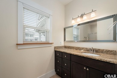 This turnkey 5-bedroom, 3.5-bath home is in the community of on The Currituck Golf Club in North Carolina - for sale on GolfHomes.com, golf home, golf lot