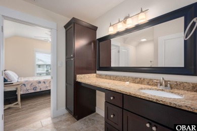This turnkey 5-bedroom, 3.5-bath home is in the community of on The Currituck Golf Club in North Carolina - for sale on GolfHomes.com, golf home, golf lot