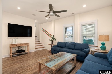 This turnkey 5-bedroom, 3.5-bath home is in the community of on The Currituck Golf Club in North Carolina - for sale on GolfHomes.com, golf home, golf lot