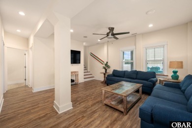 This turnkey 5-bedroom, 3.5-bath home is in the community of on The Currituck Golf Club in North Carolina - for sale on GolfHomes.com, golf home, golf lot
