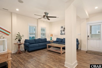 This turnkey 5-bedroom, 3.5-bath home is in the community of on The Currituck Golf Club in North Carolina - for sale on GolfHomes.com, golf home, golf lot