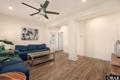 This turnkey 5-bedroom, 3.5-bath home is in the community of on The Currituck Golf Club in North Carolina - for sale on GolfHomes.com, golf home, golf lot