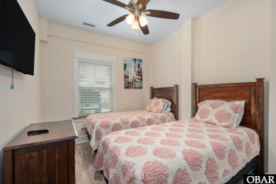 This turnkey 5-bedroom, 3.5-bath home is in the community of on The Currituck Golf Club in North Carolina - for sale on GolfHomes.com, golf home, golf lot