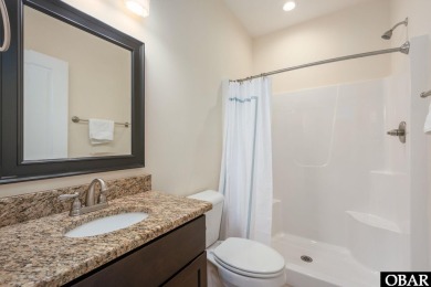 This turnkey 5-bedroom, 3.5-bath home is in the community of on The Currituck Golf Club in North Carolina - for sale on GolfHomes.com, golf home, golf lot