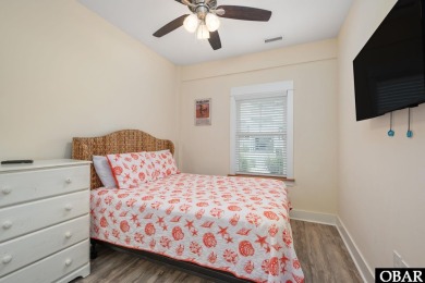 This turnkey 5-bedroom, 3.5-bath home is in the community of on The Currituck Golf Club in North Carolina - for sale on GolfHomes.com, golf home, golf lot
