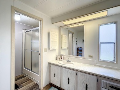 GREAT HOME! Welcome to KOVE ESTATES, a community that offers on Cypress Point RV Golf Club in Florida - for sale on GolfHomes.com, golf home, golf lot