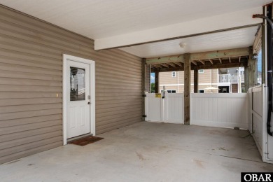 This turnkey 5-bedroom, 3.5-bath home is in the community of on The Currituck Golf Club in North Carolina - for sale on GolfHomes.com, golf home, golf lot