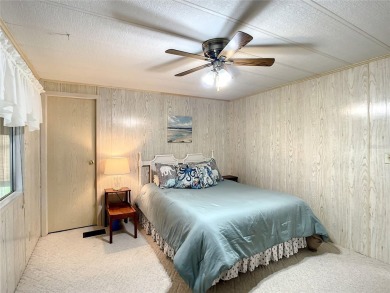 GREAT HOME! Welcome to KOVE ESTATES, a community that offers on Cypress Point RV Golf Club in Florida - for sale on GolfHomes.com, golf home, golf lot