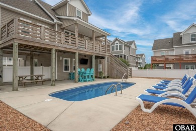 This turnkey 5-bedroom, 3.5-bath home is in the community of on The Currituck Golf Club in North Carolina - for sale on GolfHomes.com, golf home, golf lot