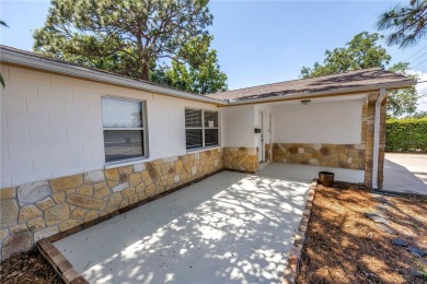 Located in a prime Northeast St. Petersburg neighborhood, this on Mangrove Bay Golf Course in Florida - for sale on GolfHomes.com, golf home, golf lot