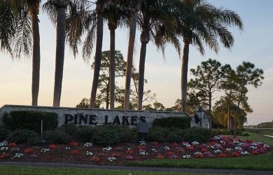 THANKSGIVING SPECIAL! PRICE LISTED IS $10,000 OFF! This charming on Pine Lakes Country Club in Florida - for sale on GolfHomes.com, golf home, golf lot