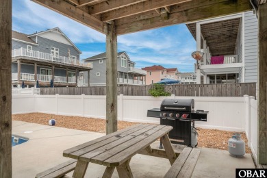 This turnkey 5-bedroom, 3.5-bath home is in the community of on The Currituck Golf Club in North Carolina - for sale on GolfHomes.com, golf home, golf lot