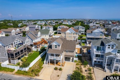 This turnkey 5-bedroom, 3.5-bath home is in the community of on The Currituck Golf Club in North Carolina - for sale on GolfHomes.com, golf home, golf lot