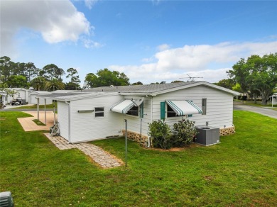 GREAT HOME! Welcome to KOVE ESTATES, a community that offers on Cypress Point RV Golf Club in Florida - for sale on GolfHomes.com, golf home, golf lot