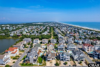 This turnkey 5-bedroom, 3.5-bath home is in the community of on The Currituck Golf Club in North Carolina - for sale on GolfHomes.com, golf home, golf lot