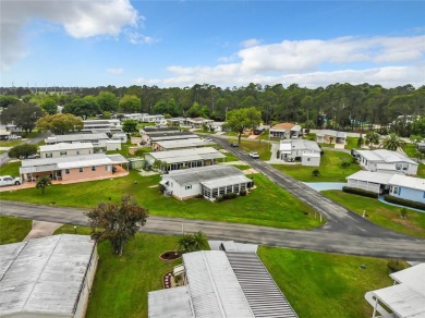 GREAT HOME! Welcome to KOVE ESTATES, a community that offers on Cypress Point RV Golf Club in Florida - for sale on GolfHomes.com, golf home, golf lot