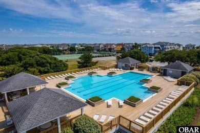 This turnkey 5-bedroom, 3.5-bath home is in the community of on The Currituck Golf Club in North Carolina - for sale on GolfHomes.com, golf home, golf lot