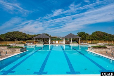This turnkey 5-bedroom, 3.5-bath home is in the community of on The Currituck Golf Club in North Carolina - for sale on GolfHomes.com, golf home, golf lot
