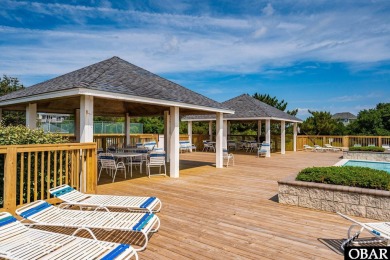 This turnkey 5-bedroom, 3.5-bath home is in the community of on The Currituck Golf Club in North Carolina - for sale on GolfHomes.com, golf home, golf lot