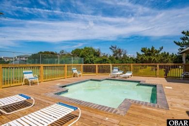 This turnkey 5-bedroom, 3.5-bath home is in the community of on The Currituck Golf Club in North Carolina - for sale on GolfHomes.com, golf home, golf lot