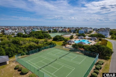 This turnkey 5-bedroom, 3.5-bath home is in the community of on The Currituck Golf Club in North Carolina - for sale on GolfHomes.com, golf home, golf lot