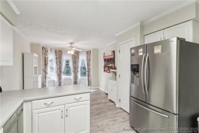 Nestled in the sought-after gated community of Carolina Trace on Carolina Trace Country Club in North Carolina - for sale on GolfHomes.com, golf home, golf lot
