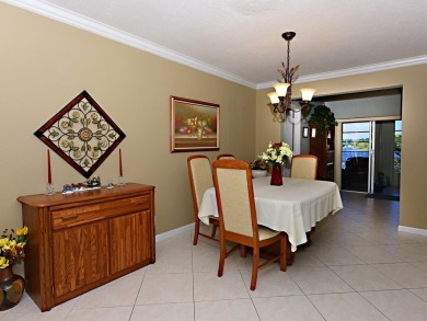 Great 2Br/2 bath on the Lake in a private 55 plus community with on Cypress Lakes Golf Course - West Palm Beach in Florida - for sale on GolfHomes.com, golf home, golf lot