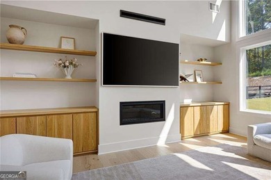 Welcome home to this executive home built by the Toll Brothers on Capital City Club Crabapple in Georgia - for sale on GolfHomes.com, golf home, golf lot