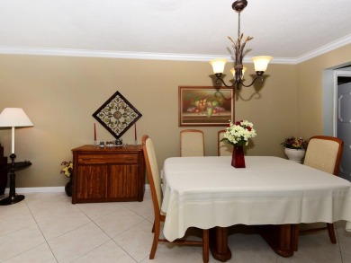 Great 2Br/2 bath on the Lake in a private 55 plus community with on Cypress Lakes Golf Course - West Palm Beach in Florida - for sale on GolfHomes.com, golf home, golf lot