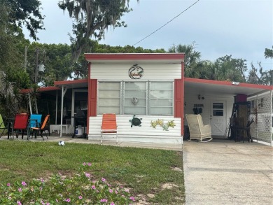 Nestled in the highly sought-after 55+ community of IMPERIAL on Bay Tree Golf Course in Florida - for sale on GolfHomes.com, golf home, golf lot
