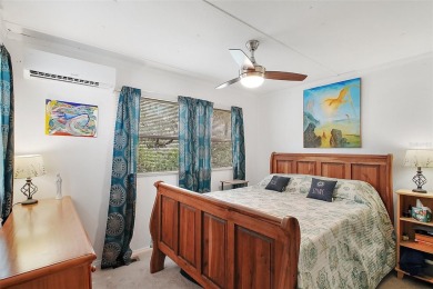 Nestled in the highly sought-after 55+ community of IMPERIAL on Bay Tree Golf Course in Florida - for sale on GolfHomes.com, golf home, golf lot