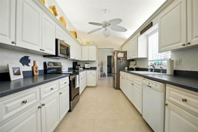 Meticulously Maintained Home with Golf Course Views in 55+ Gated on The Links of Spruce Creek in Florida - for sale on GolfHomes.com, golf home, golf lot