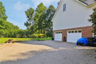Nestled in the sought-after gated community of Carolina Trace on Carolina Trace Country Club in North Carolina - for sale on GolfHomes.com, golf home, golf lot