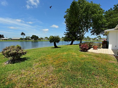 Great 2Br/2 bath on the Lake in a private 55 plus community with on Cypress Lakes Golf Course - West Palm Beach in Florida - for sale on GolfHomes.com, golf home, golf lot