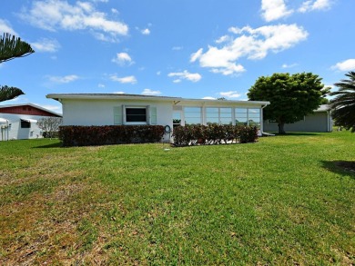 Great 2Br/2 bath on the Lake in a private 55 plus community with on Cypress Lakes Golf Course - West Palm Beach in Florida - for sale on GolfHomes.com, golf home, golf lot