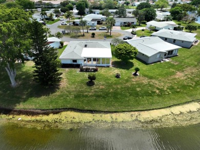 Great 2Br/2 bath on the Lake in a private 55 plus community with on Cypress Lakes Golf Course - West Palm Beach in Florida - for sale on GolfHomes.com, golf home, golf lot