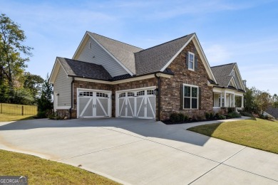 Nestled in the prestigious Traditions of Braselton golf course on Traditions of Braselton Golf Club in Georgia - for sale on GolfHomes.com, golf home, golf lot