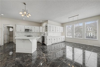 Welcome to this beautifully maintained 4-bedroom, 3.1-bath home on Falcon Valley Golf Course in Kansas - for sale on GolfHomes.com, golf home, golf lot