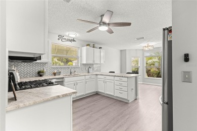 BOND PAID!! NO CARPET!! ROOF 2017!!! Welcome to this charming on El Santiago Executive Golf Course in Florida - for sale on GolfHomes.com, golf home, golf lot