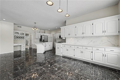 Welcome to this beautifully maintained 4-bedroom, 3.1-bath home on Falcon Valley Golf Course in Kansas - for sale on GolfHomes.com, golf home, golf lot