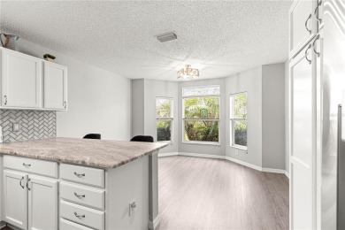 BOND PAID!! NO CARPET!! ROOF 2017!!! Welcome to this charming on El Santiago Executive Golf Course in Florida - for sale on GolfHomes.com, golf home, golf lot