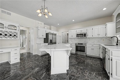 Welcome to this beautifully maintained 4-bedroom, 3.1-bath home on Falcon Valley Golf Course in Kansas - for sale on GolfHomes.com, golf home, golf lot