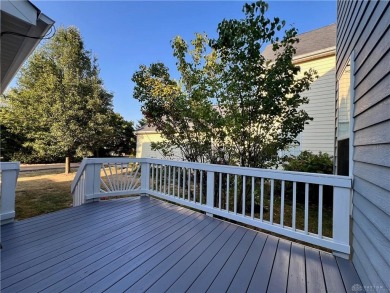 Enjoy a beautiful view of the lake from your large covered front on The Golf Club At Yankee Trace in Ohio - for sale on GolfHomes.com, golf home, golf lot