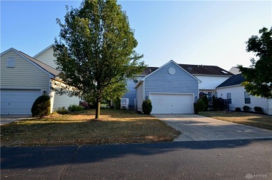 Enjoy a beautiful view of the lake from your large covered front on The Golf Club At Yankee Trace in Ohio - for sale on GolfHomes.com, golf home, golf lot