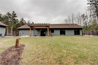 Welcome to this beautifully crafted one-level home, perfectly on Headwaters Country Club in Minnesota - for sale on GolfHomes.com, golf home, golf lot