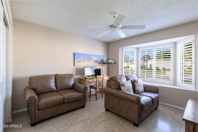 Enjoy resort-style living in this charming 2-bedroom, 2-bath on Westbrook Village Golf Club in Arizona - for sale on GolfHomes.com, golf home, golf lot