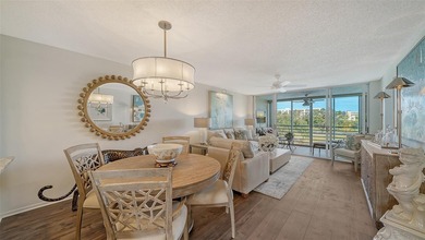 Enjoy sunny, panoramic views across the pool, lakes, and golf on Pinebrook/Ironwood Golf Course in Florida - for sale on GolfHomes.com, golf home, golf lot