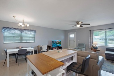 55+ Community ~ Adorable 1 bedroom, 1 bath & 1 carport condo on Summertree Golf Course in Florida - for sale on GolfHomes.com, golf home, golf lot