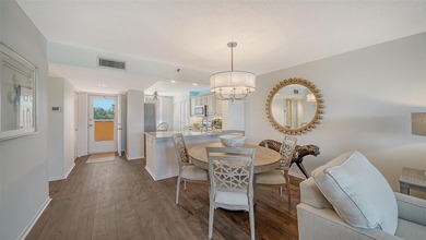 Enjoy sunny, panoramic views across the pool, lakes, and golf on Pinebrook/Ironwood Golf Course in Florida - for sale on GolfHomes.com, golf home, golf lot